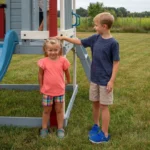 Kids Outdoor Playhouse with Slide – Elevated Blue Playhouse with Ladder & Balcony - Image 2