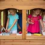 Wooden Kids Playhouse – Cottage Style Outdoor Playhouse with Bench, Door & Windows - Image 4